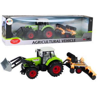 Traktor rolniczy koparka z broną talerzową napęd zielony