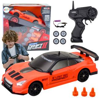 Autko sportowe zdalnie sterowane r/c 1:24 pomarańczowe wymienne koła