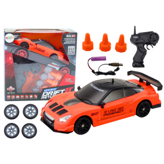 Autko sportowe zdalnie sterowane r/c 1:24 pomarańczowe wymienne koła