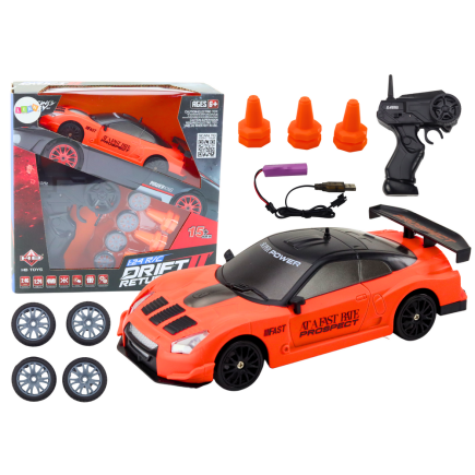 Autko sportowe zdalnie sterowane r/c 1:24 pomarańczowe wymienne koła