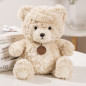 Pluszowa maskotka przytulanka miś z medalionem beżowy 25cm EAN: 5905991047230