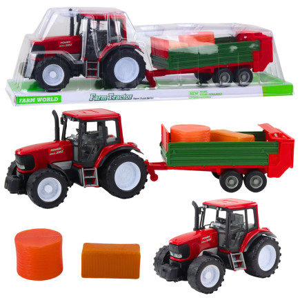 Traktor rolniczy farmerski z zieloną przyczepą i sianem czerwony