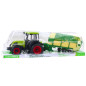 Traktor rolniczy farmerski z zielono-żółtą przyczepą zielony