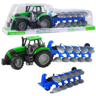 Traktor rolniczy farmerski z pługiem napęd zielony