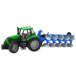 Traktor rolniczy farmerski z pługiem napęd zielony